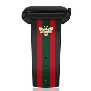 MOINSPIRE brown leather Apple Watch band with bee charms and tri-color accents on a white background