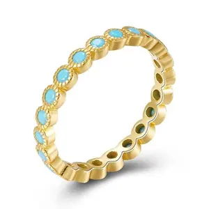 OIDIMS thin turquoise stackable ring band on finger
