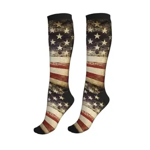 Figtihw knee high American flag compression socks against white background