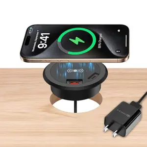 Hopopower Type-C grommet wireless charger inserted into desk hole with phone charging