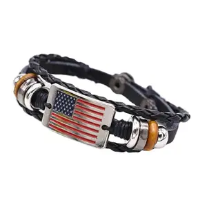 Black leather braided bracelet with wooden beads and silver flag charm