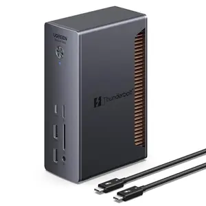 UGREEN Thunderbolt 5 Dock in black, connected to a MacBook Pro with dual monitors