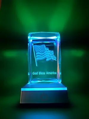 Jassence crystal cube night light with 3D American flag effect on a nightstand