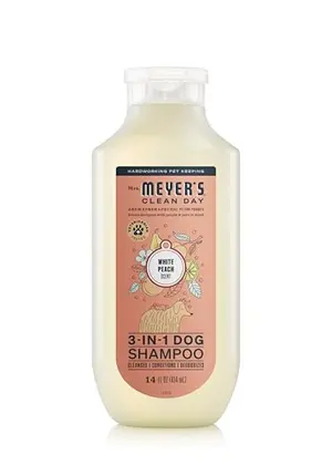 Mrs. Meyer's Clean Day Dog Shampoo bottle with peach illustrations