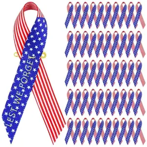 100-piece bulk pack of red, white, and blue ribbon pins with 'Lest We Forget'