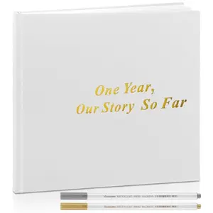 White hardcover couples scrapbook with gold text