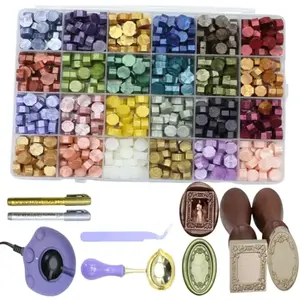 Atopbb wax seal kit with electric warmer, frame stamp, tweezers, and assorted beads
