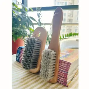 Two long-handled wooden laundry brushes with nylon bristles