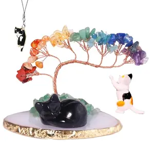Crystal tree with black obsidian sleeping cat statue