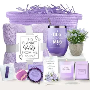 AMIDA sympathy basket with coral velvet blanket, scented candle, and healing bracelet