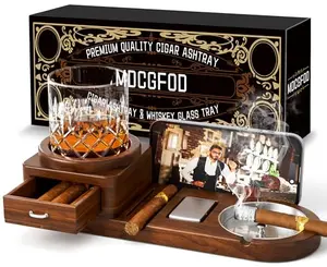 Wooden cigar ashtray coaster with metal insert and drawer on a bar