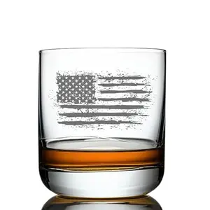 Whiskey glass with worn American flag design