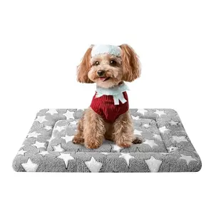Grey star-patterned dog bed mat with a non-slip bottom, folded to show both sides