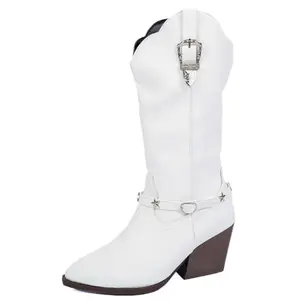 White mid-calf cowboy boots with star embellishments