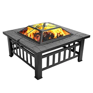 Square black metal fire pit with mesh lid on a brick patio