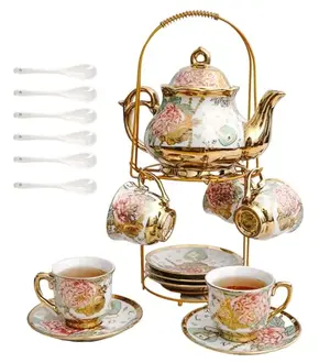 20-piece vintage tea set with metal cup holder and golden rose design