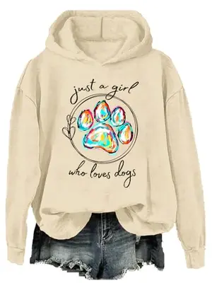Cute oversized 'Just A Girl Who Loves Dogs' hoodie in soft pink with a large front pocket, ideal for lounging or dog walks.