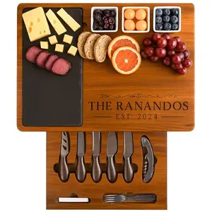 Craft Corner House acacia wood charcuterie board with black slate surface and ceramic dipping bowls
