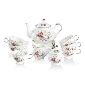 Sweejar tea set with relief details and gold rims on a table