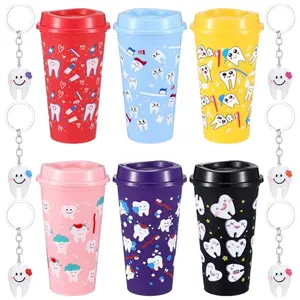 Skylety dental tumblers with tooth keychains arrayed on a table
