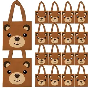 Brown non-woven fabric tote bags with bear faces, showing their reusable material and handles
