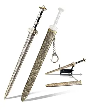 Sword-style letter opener with sheath and display stand on a desk