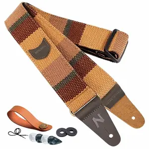 Nefelibata Guitar Strap with pick pocket, cowhide leather ends, and yellow stripes design