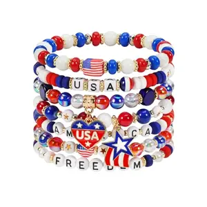 Set of multiple beaded bracelets with USA letters and American flag charms