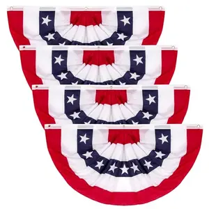 Set of four red white and blue pleated fan flags hanging on a porch railing