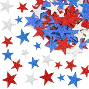 Red, blue, and silver glitter foam star stickers in three sizes on a child's hand