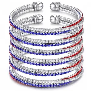 Six stackable elastic bracelets featuring red, white, and blue rhinestones in American flag patterns