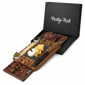 Rectangular acacia wood charcuterie board with removable slate insert and cheese knife set in sliding drawer