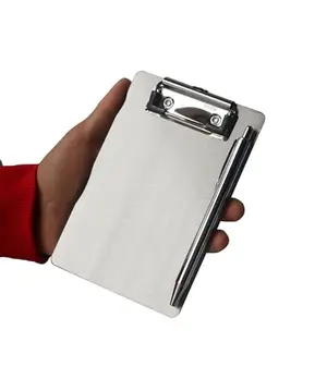 Small silver Banjiang magnetic clipboard on a refrigerator with a shopping list