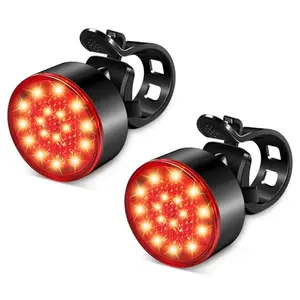Ascher two pack red tail lights mounted on seatpost and backpack