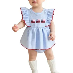 Baby girl in Socutebabe red, white, and blue smocked romper with tutu skirt
