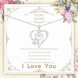 Sterling silver heart necklace with cubic zirconia and I Love You engraving
