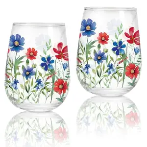Set of two stemless wine glasses with watercolor red, white, and blue floral design