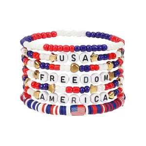Briutn beaded bracelets in red, white, and blue stacked on a wrist