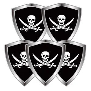 Shield shaped pirate flag decal on laptop