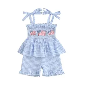 Rarjuiey toddler girl in American flag romper with ruffle trim and smocked design