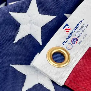 Heavy duty nylon American flag flying proudly on a flagpole in an outdoor kitchen setting