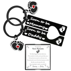 Stainless steel mommy and daddy keychain set