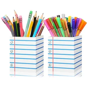 Two wooden pencil cups with notebook pattern