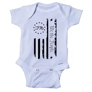 Baby in white 'We the People 1776' onesie by Ink Trendz