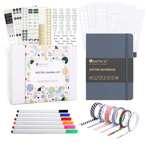 &And Per Se journaling kit in dark blue box, including notebook and supplies