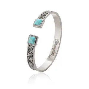 Silver plated western bracelet with carved floral pattern and turquoise clasp