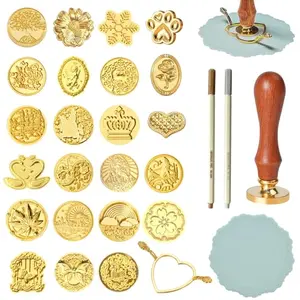 BATHRINS wax seal stamp kit with stamp heads, molds, silicone mat, and pens on a craft table