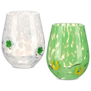 Set of two Mimorou Irish icon juice glasses with shamrock and horseshoe designs