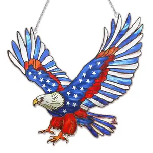 Stained glass eagle suncatcher with red, white, and blue colors and a chain