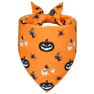 WoffBow reversible Halloween dog bandana with jack-o-lantern and spiderweb prints on a large dog